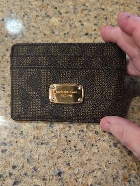 Michael Kors Brown and Dark Brown Monogram Card Holder with Gold Plaque